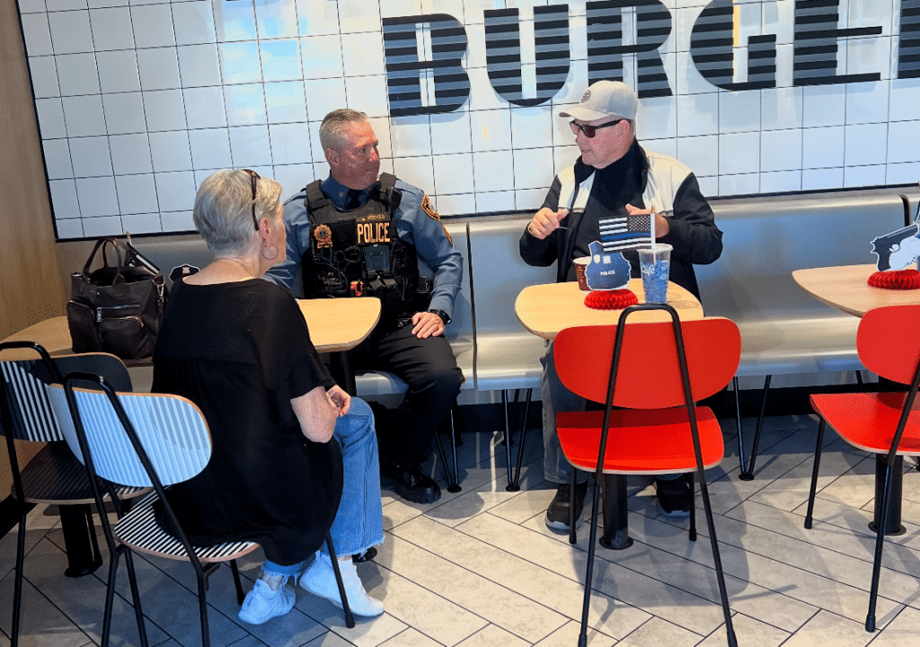 Community members speaking with a Falls Township Police Officer
