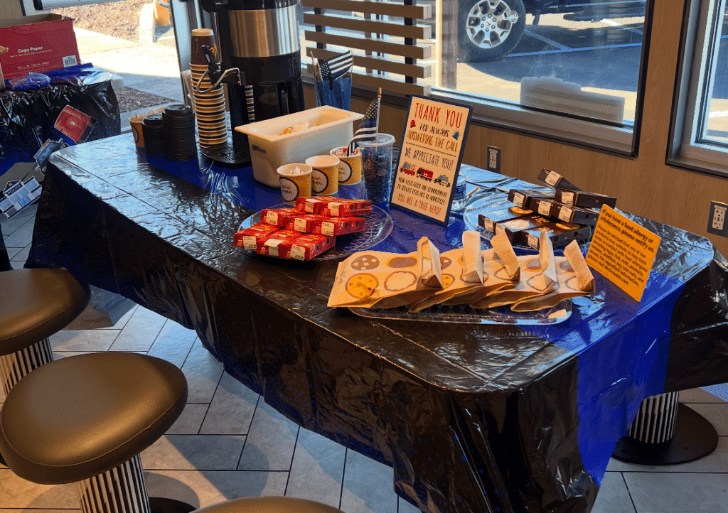 A photo of free McCafe Coffee, with McDonald's pies and cookies for the community