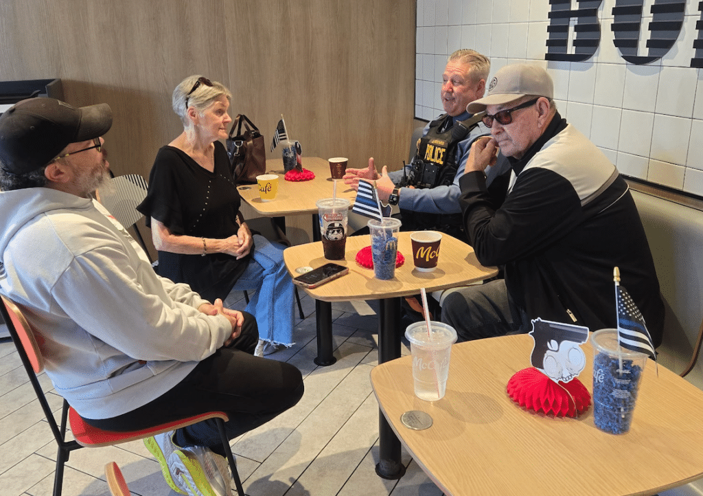 Community members speaking with a Falls Township Police Officer