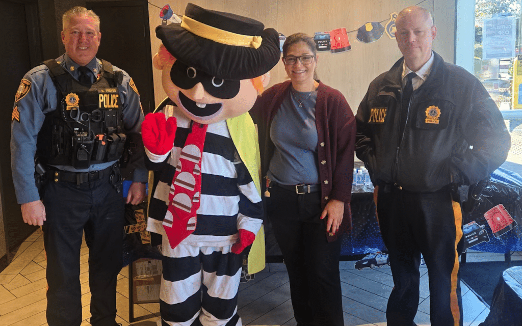 Falls Township Police posing with Hamburglar and a McDonald's employee